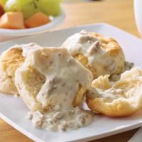 Biscuits & Gravy · 3 biscuits covered in gravy.