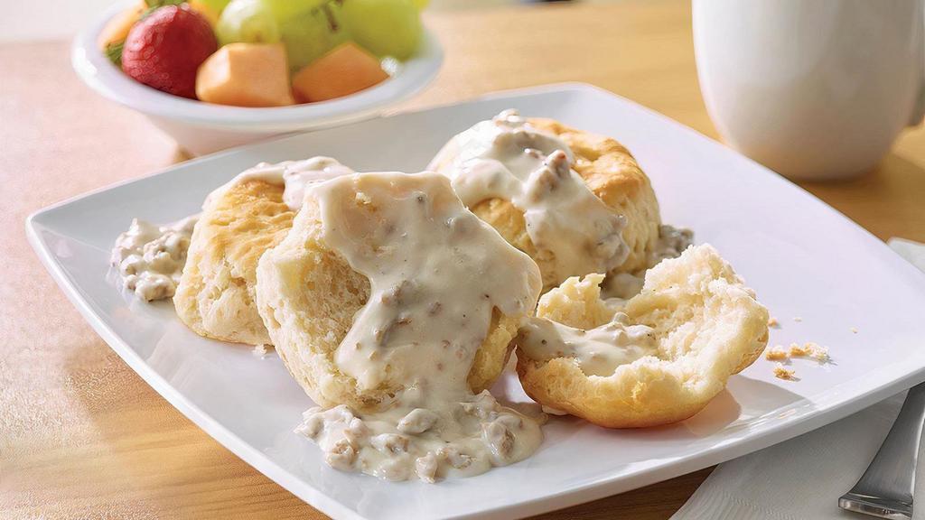 Biscuits & Gravy · 3 biscuits covered in gravy.