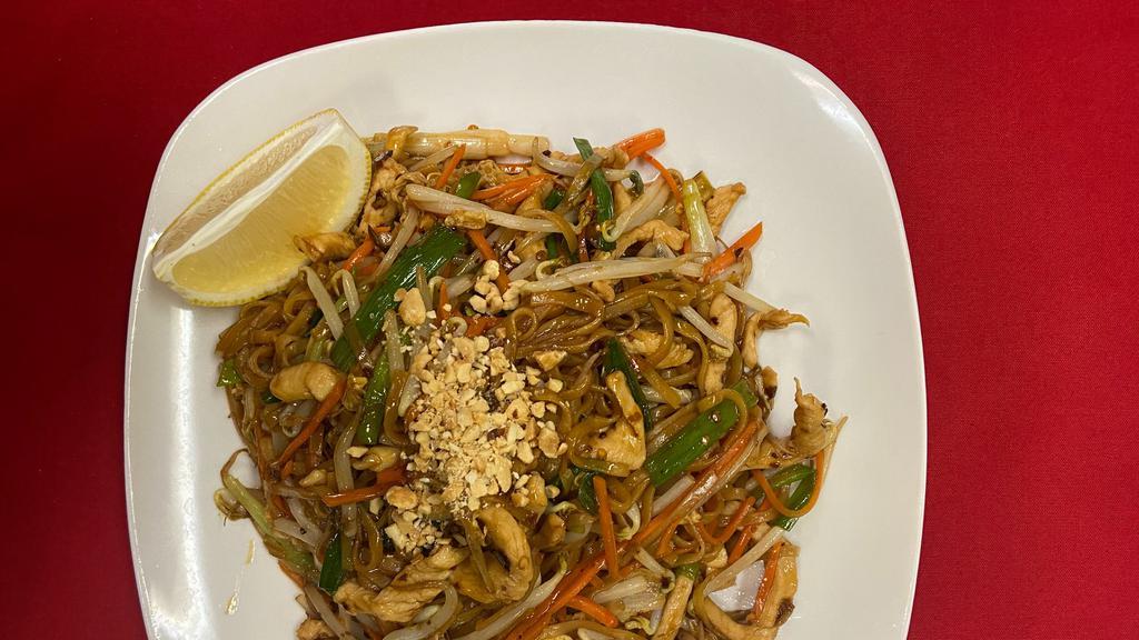 Pad Thai · Traditional rice noodles served with eggs, green onions, bean sprouts, carrots and crushed peanuts.