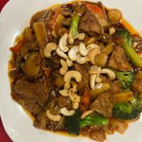 Pad Cashew Nuts · Sauteed with roasted cashew nuts, mushrooms, bamboo shoots, water chestnuts, carrots and bro...