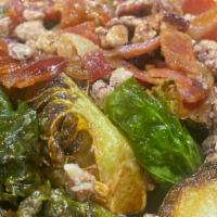 Caramelized Brussels Sprouts · Candied pecans, applewood bacon, and jalapeño honey.