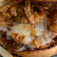 Brisket Sandwich · Smoked brisket, cheddar cheese, fried onions, BBQ sauce, pickles, comeback sauce, toasted br...