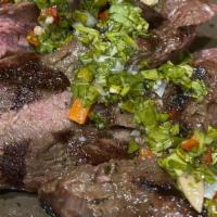 Grilled Steak · Dry rubbed marinated Kobe sirloin steak, chimichurri, choice of two sides. Recommended to be...