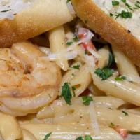 Bayou Pasta · Mini penne, gulf shrimp, andouille sausage, roasted red peppers, spinach, white wine cream s...