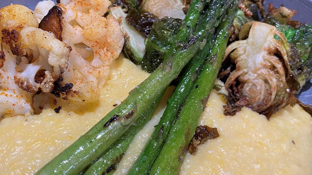 Veggies 3 Ways · pan-roasted cauliflower steak, grilled asparagus, fried brussels sprouts, lemon butter sauce, creamy cheddar grits
