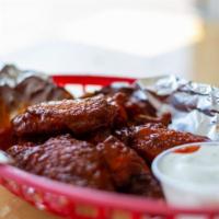 6 Traditional · 6 Bone-In wings tossed in your choice of Mild, Hot, Hot BBQ, Savory BBQ, Roasted garlic BBQ,...
