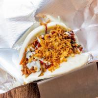 Steam Buns · Your choice of protein served in a steamy bun topped with wasabi mayo and fried shallots. Po...