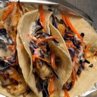 California Fish Tacos (3) · 3 tilapia fillet cuts marinated in our secret marinade, grilled to perfection and served on ...