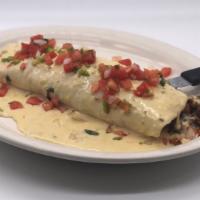 Burrito San Jose · 1 huge burrito stuffed with grilled chicken, chorizo, rice and beans, topped with cheese sau...