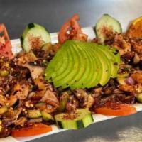 Botana Mixta · Octopus, surimi and shrimp salad. * 
 
*House specialty