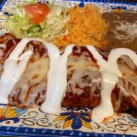 Enchiladas Los Corrales (2) · Giant enchilada (s) filled with your choice of meat, dipped in our house special recipe Dura...
