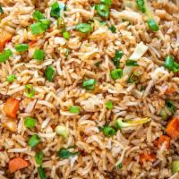 Fried Rice [Vegan] · Long grain aromatic rice wok tossed with vegetables and indo-chinese sauces