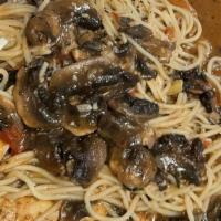 Chicken Marsala · Served mushrooms and marsala wine, over spaghetti.