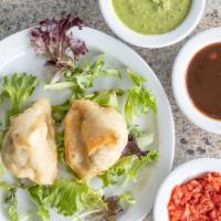 Vegetable Samosa (2 Pieces) · Crispy flour shell stuffed with potatoes, greens and spices