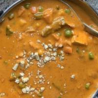 Navratan Korma · Fresh mixed vegetables simmered in a creamy tomato and onion sauce