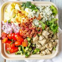 Cobb Salad · A fresh begetable blend of grape tomatoes, cucumbers, diced red onion and bacon served over ...