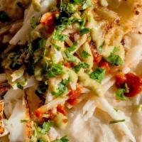 Blackened Fish · Blackened Cod served over Jicama slaw and topped with roasted chili salsa, avocado crema and...