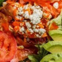 Buffalo Chicken Salad · Mixed greens, sliced chicken breast tossed with spicy wing sauce, bacon, crumbled Bleu chees...