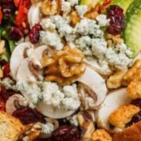 Walnut Spinach Salad · Baby spinach, walnut pieces, crumbled Bleu cheese, avocado, sundried tomatoes, mushrooms, dr...