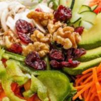 Spa Salad · Mixed greens, plum tomatoes, avocado, walnut pieces, dried cranberries, green pepper, cucumb...