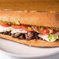 Steak · Thinly sliced grilled seasoned steak, topped with fresh-cut tomato, onion, avocado, romaine ...