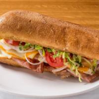 Jamon Y Queso · Dearborn Ham, Munster/Colby cheese blend, light bean spread, tomato, onion, romaine, pickled...
