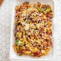Loaded Skillet Potatoes · With cheese, bacon, green peppers and onions.