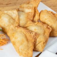 Crab Rangoon (6) · House made. Deep-fried combination of cream cheese and imitation crab meat.