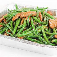 Beef With Green Beans · Sliced beef with green beans and onions in a brown sauce.