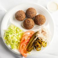 Order Falafel · 4 pieces Falafel with a side of salad and our signature Tahini Sauce.