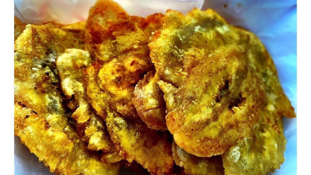 Tostones · Fried plantains.