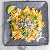 Birria Fries · French fries topped with Birria Beef or Chicken, Nacho Cheese, Sour Cream, Salsa Verde, Cila...
