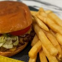 Ka'Ris Burger  · 1/2 pound freshly handmade smash burger seasoned to perfection on a warm toasted brioche bun...