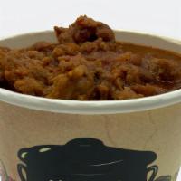 Chili Bowl · Homemade chili featuring chili beans, diced onions, crushed tomatoes, ground beef, and Grazi...
