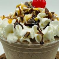 Turtletop Milkshake · Favorite flavor mix: Vanilla ice cream, homemade chocolate sauce, caramel, triple chocolate ...