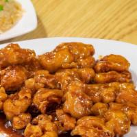 Orange Chicken · Dishes will come with a choice of Fried or White rice.