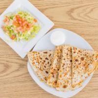 Cheese Quesadilla · Large cheese quesadilla 
Tomato and lettuce and sour cream on the side