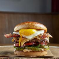 Farmhouse Burger · Premium black angus beef, cage free organic egg,bacon,pepperjack, lettuce, tomato,pickle, gr...