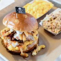 The Butcher’S Bill · ½ lb. chicken sandwich topped with our secret scurvy sauce, mac and cheese, fries and ranch ...