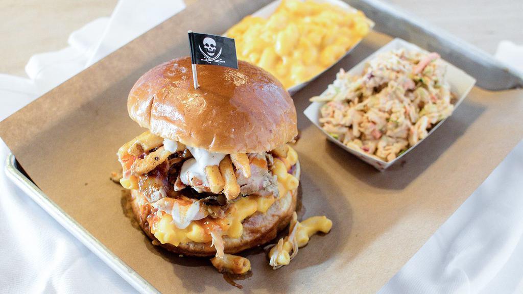 The Butcher’S Bill · ½ lb. chicken sandwich topped with our secret scurvy sauce, mac and cheese, fries and ranch dressing on a garlic butter bun.