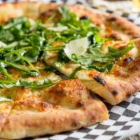 Arugula · Oil, mozzarella, arugula, and fresh lemon juice.