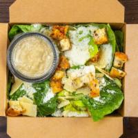 Classic Caesar · Romaine, shaved parmesan, croutons, and anchovy vinaigrette.