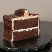 Lumpy Bumpy Cake Slice · Chocolate Cake, Buttercream filling, Dipped in Chocolate Ganache