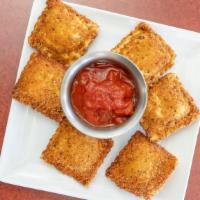 Cheese Ravioli · 6 Pieces of breaded Crispy raviolis filled with flavor and cheese served with marinara sauce.