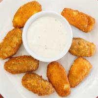 Jalapeño Poppers · 8 Pieces of breaded jalapeños filled with cream cheese served with Ranch dressing.