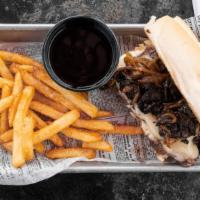 Steak Sandwich · Tender sliced steak smothered in sauteed onions, mushrooms and Swiss cheese on a sourdough b...