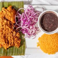Cochinita Pibil · A yucatan peninsula iconic dish. Slow cooked pork in banana leaves, marinated with achiote, ...