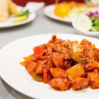 Spicy Chicken · breaded chicken stir-fry with onions, carrots, green  peppers & sweet  spicy sauce; served  ...