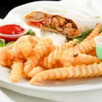 Chicken Shawarma · Marinated tender chicken slowly cooked served with tomato, pickles, and mayo.