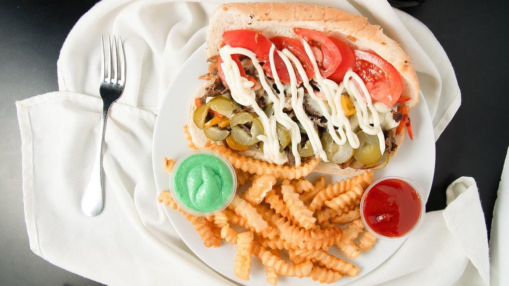 Philly Steak · Thin slice of tenderloin beef, sautéed onion and peppers, mushroom, cheese served with tomato and mayo.
